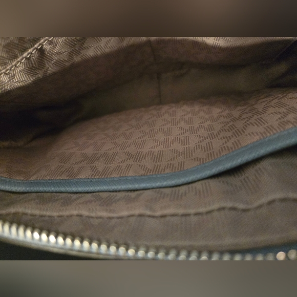 The Michael Kors Jet Set Travel Crossbody Bag in light blue - Picture 8 of 12